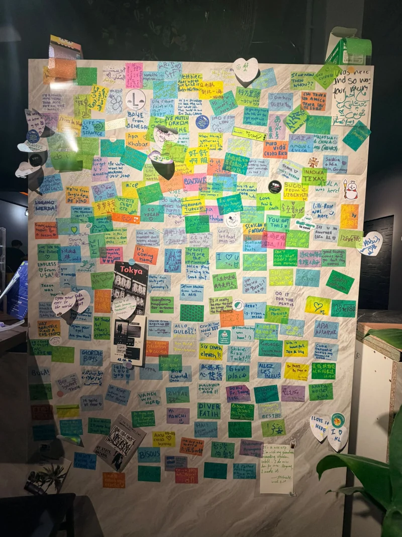Wall of handwritten notes left by guests at Travelogue Guesthouse, Kuala Lumpur