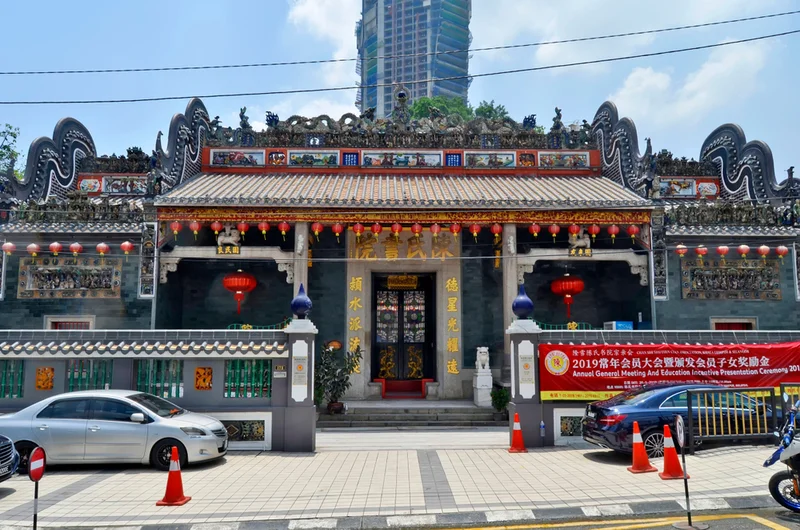 The carved Kwangtung roof of Chan See Shu Yuen Temple at the end of Jalan Petaling