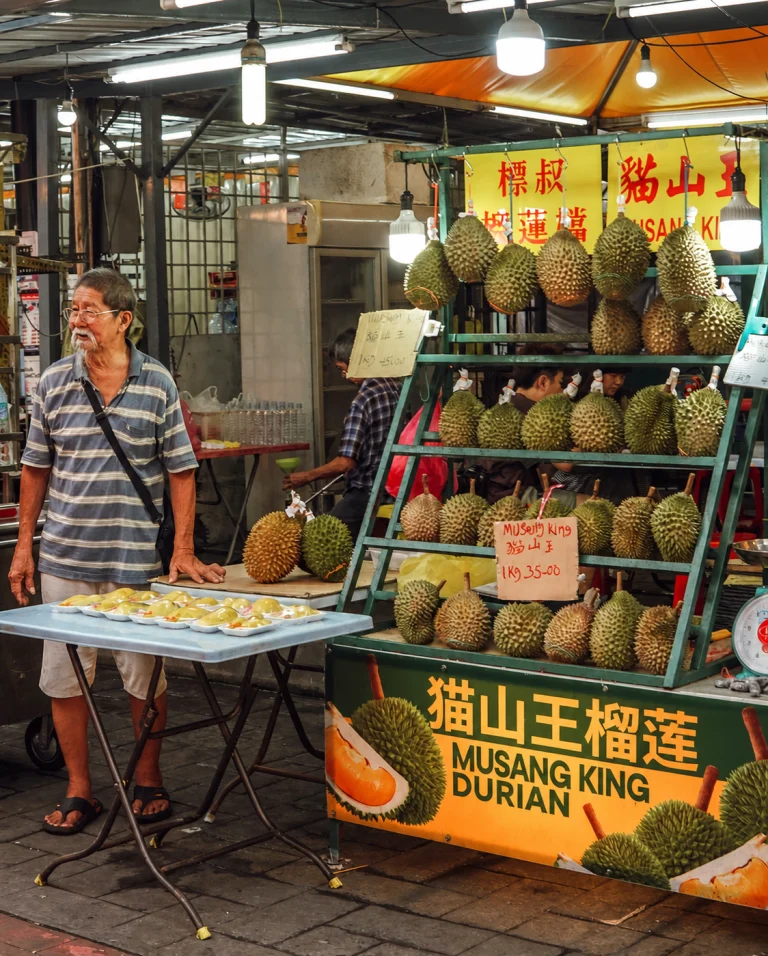 A Musang King durian stall still working on Jalan Alor, Kuala Lumpur