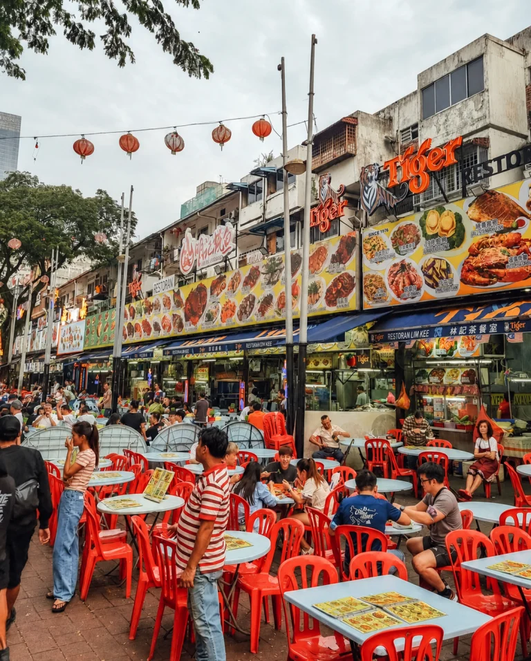 Tables and stools set out on the road along Jalan Alor, Kuala Lumpur