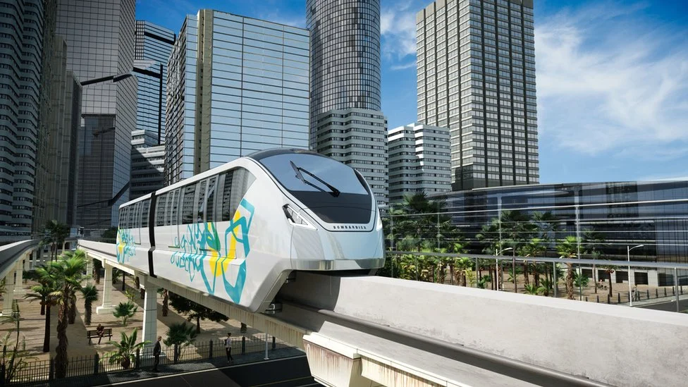 A KL Monorail train on the elevated track above Bukit Bintang