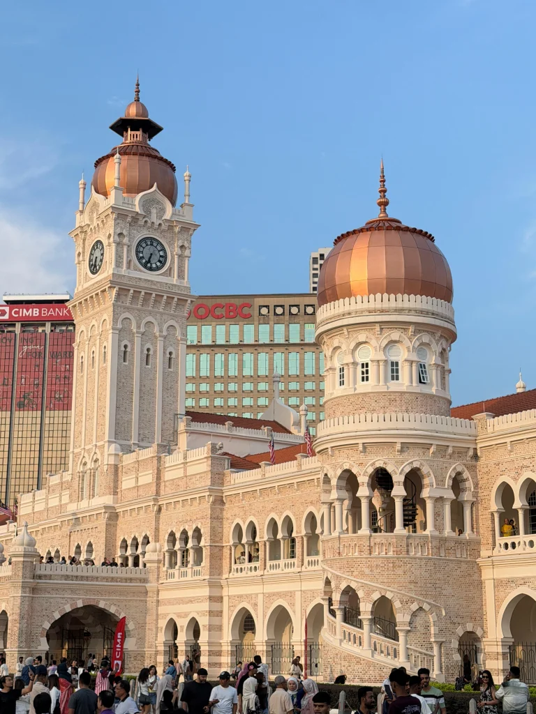 The clock tower and copper domes of the Sultan Abdul Samad building at Merdeka Square