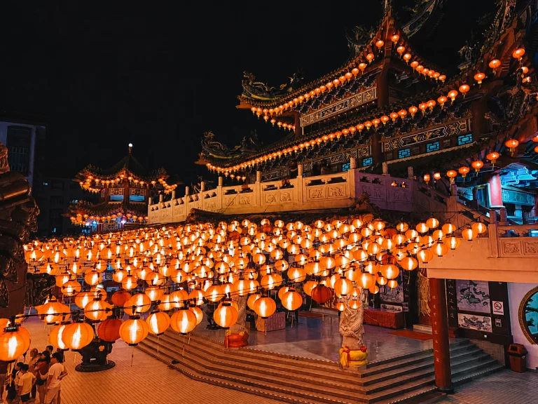 The courtyard at Thean Hou Temple hung with lit lanterns after dark, Kuala Lumpur