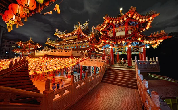 Thean Hou Temple lit from below after dark, Kuala Lumpur