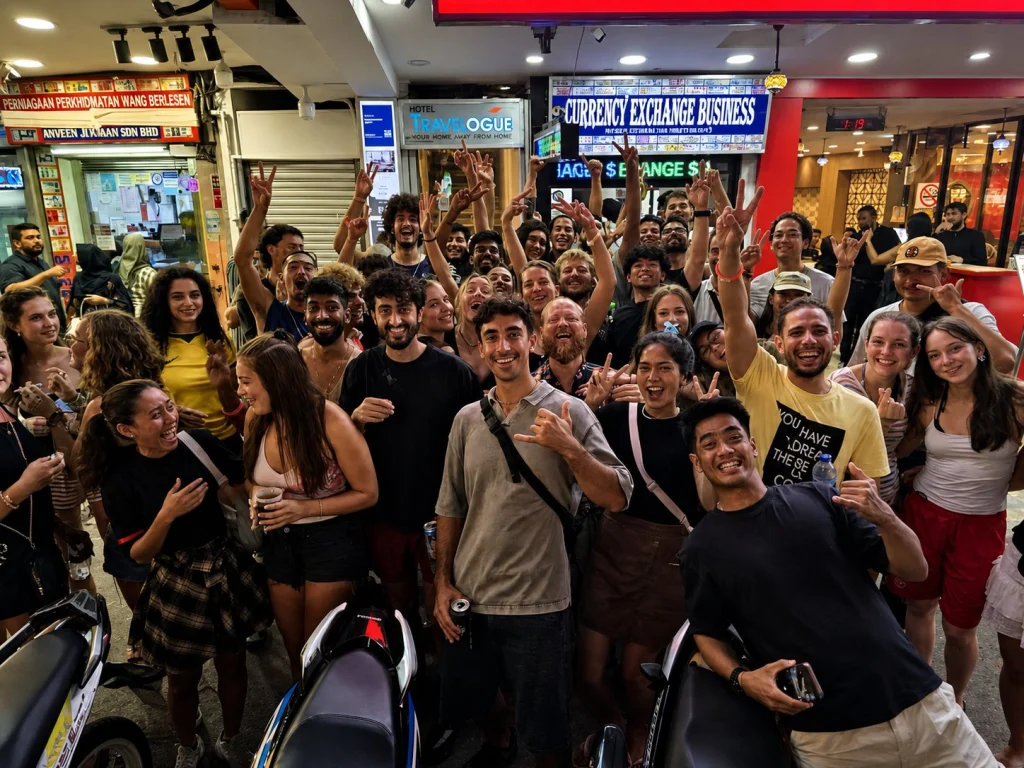 Backpackers outside Travelogue Guesthouse on Bukit Bintang, Kuala Lumpur