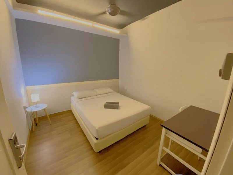 The deluxe room with a double bed at Travelogue Guesthouse, Bukit Bintang, Kuala Lumpur