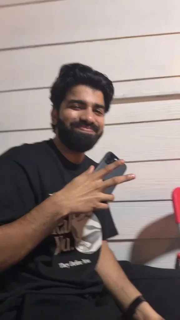 A Travelogue Guesthouse guest laughing at the table on a night out
