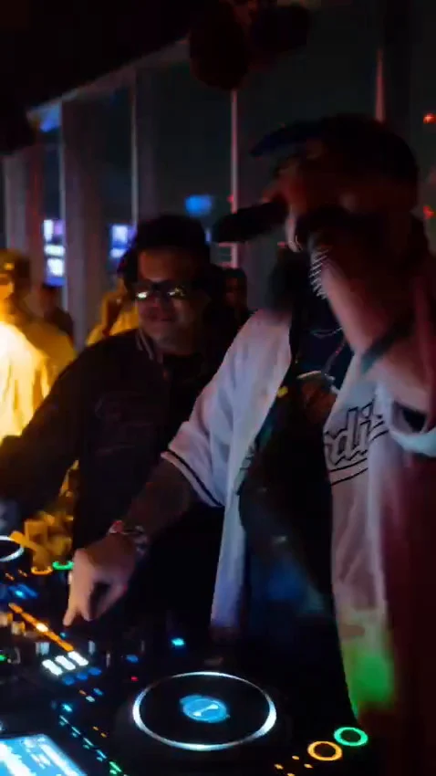 Travelogue Guesthouse guests by the decks on a night out in Kuala Lumpur