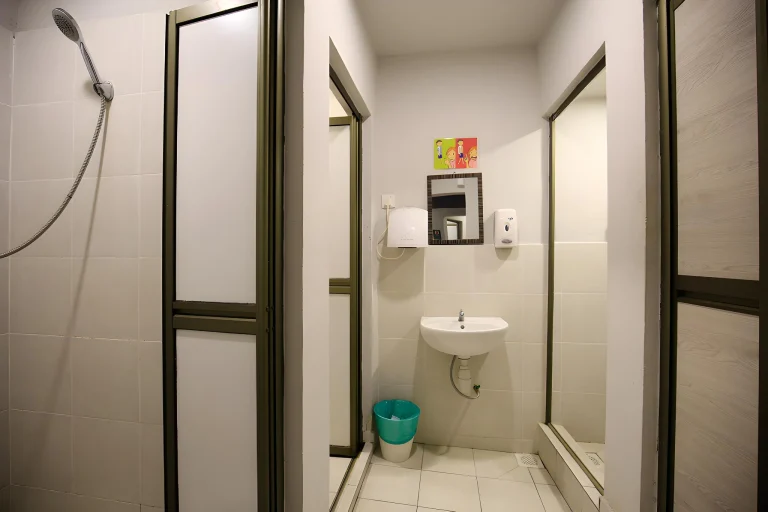 Shared shower cubicles at Travelogue Guesthouse, Bukit Bintang, Kuala Lumpur