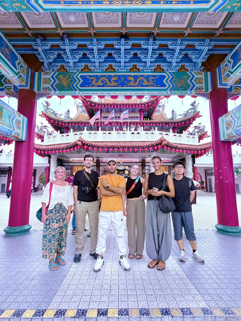 A Travelogue Guesthouse group inside the painted pavilion at Thean Hou Temple