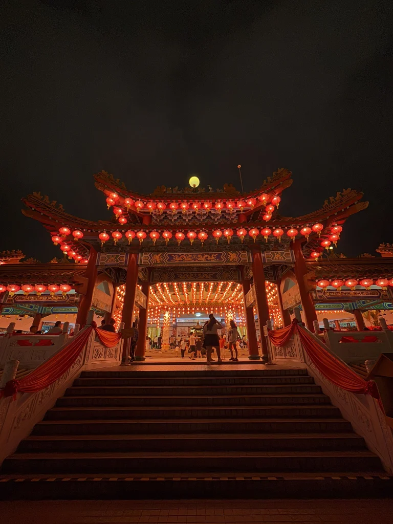 The lit gateway and steps up to Thean Hou Temple after dark, Kuala Lumpur